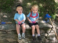 Ryan and Timothy enjoy a hiking snack